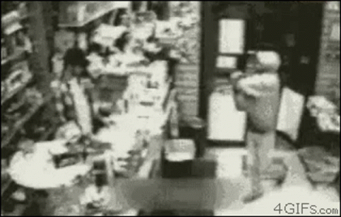 Black and White Store With Person Standing