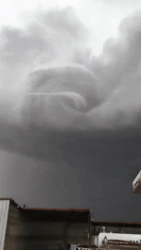 Black and White Stormy Sky With Volvo Sign