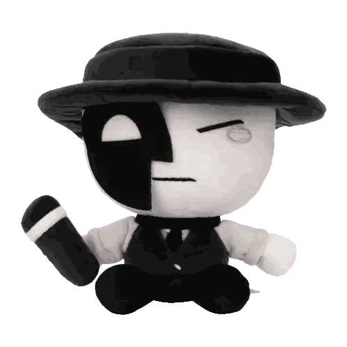 Black and White Stuffed Toy with Hat and Tie