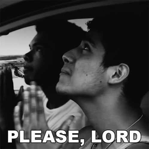 Black and White Two Men Praying in Car Please Lord