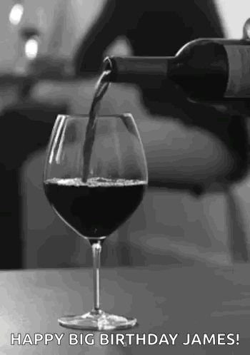 Black and White Wine Being Poured Into Glass
