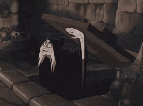 Black And White Witch Coming Out Of Hole GIF