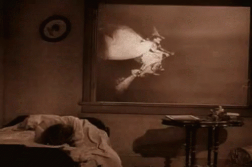 Black and White Witch on Broom in Bedroom