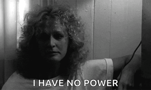 Black and White Woman Curly Hair Holding Towel Saying I Have No Power