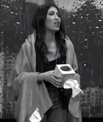 Black and White Woman Holding Box
