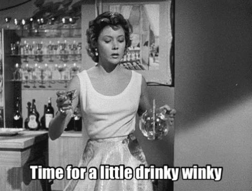 Black and White Woman Holding Glass Drinky Winky