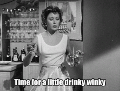 Black And White Woman Holding Glass Saying Time For A Little Drinky Winky GIF