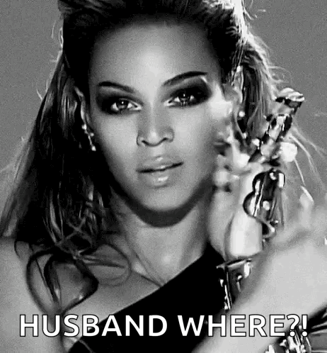 Black and White Woman Holding Gun Saying Husband Where?