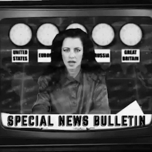 Black And White Woman Holding Special News Bulletin GIF
