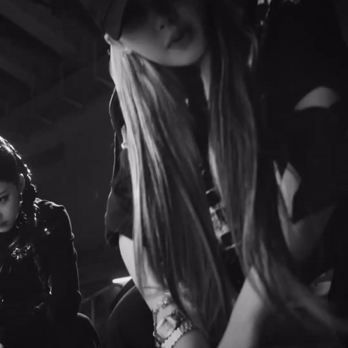 Black And White Woman In Hat And Gucci Veronica Jacket GIF
