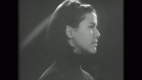 Black and White Woman Laughing in Crowd