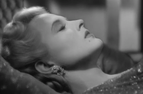 Black And White Woman Laying Down GIF