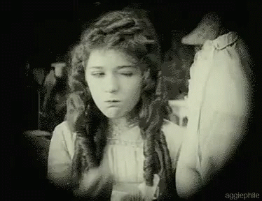 Black and White Woman Making Funny Face With Eyes Closed