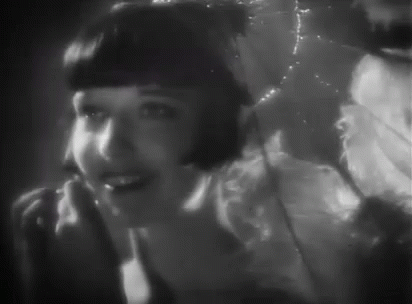Black and White Woman Talking on Phone