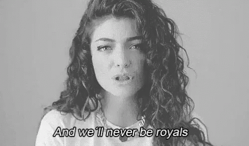 Black And White Woman With Curly Hair And We'll Never Be Royals GIF