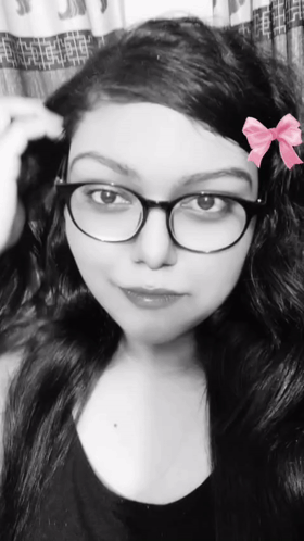 Black And White Woman With Glasses And Pink Bow GIF