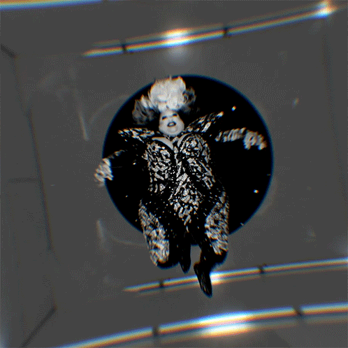 Black And White Woman With Wig GIF