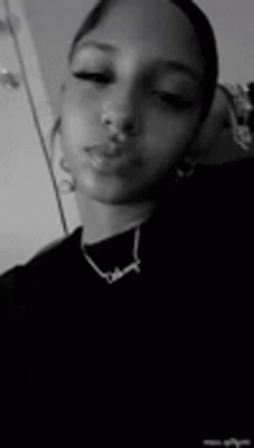 Black and White Young Woman with Necklace