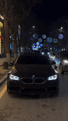 Black BMW Parked on Side of Road