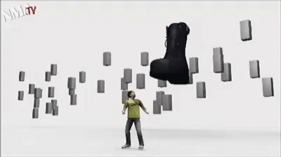 Black Boot Surrounded By Blocks With Text NMTV GIF