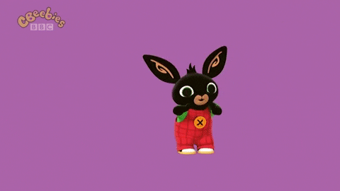 Black Bunny Enjoys Lunar New Year Fireworks Display GIF