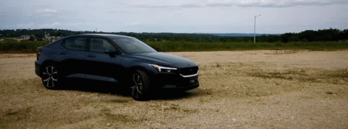 Black Car Parked On Dirt Road GIF