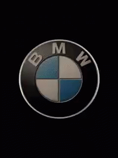 Black Car Silhouetted Against Spotlight