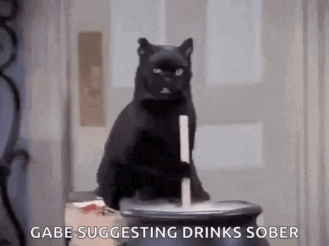 Black Cat Sitting on Cauldron with Candle