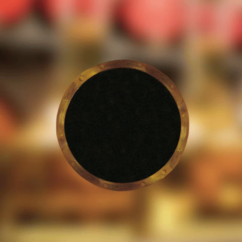 Black Circle With Gold Border Floating