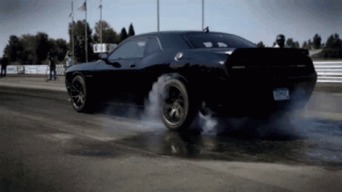 Black Dodge Challenger Burnout
