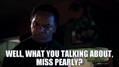 Black Dress Woman Talking On Green Couch GIF