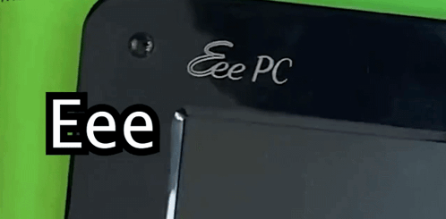 Black Eee PC on Green Background
