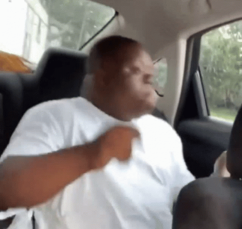 Black Fat Boy Do Turn Up While Seating GIF