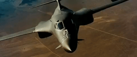 Black Fighter Jet Turns Left GIF
