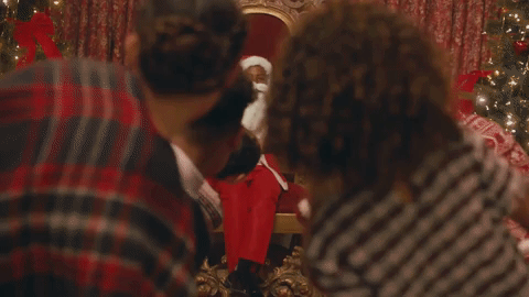 Black Girl Santa Sitting On Her Throne GIF