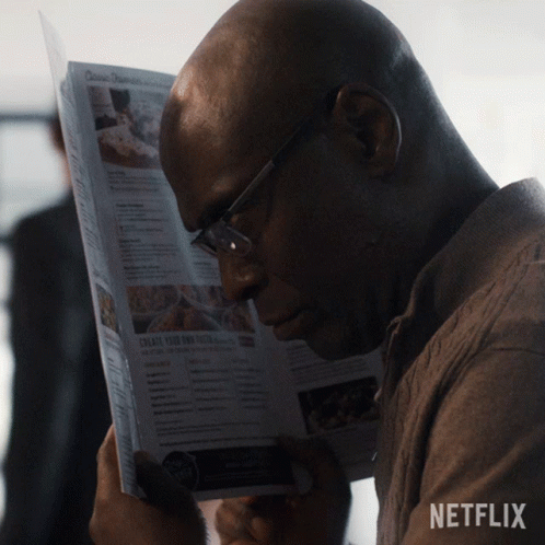 Black Guy Behind Newspaper Hiding Meme GIF