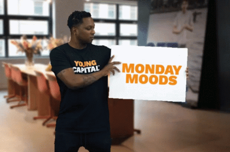 Black Guy Holding Board Saying Monday Monday Moods GIF