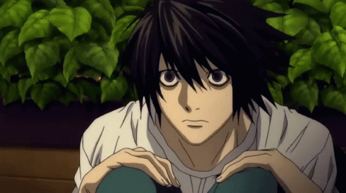 Black Haired Anime Character in White Shirt Sitting