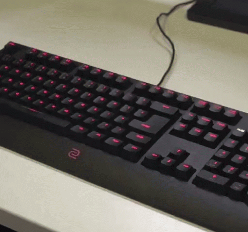 Black Keyboard With Letter R on Bottom Right