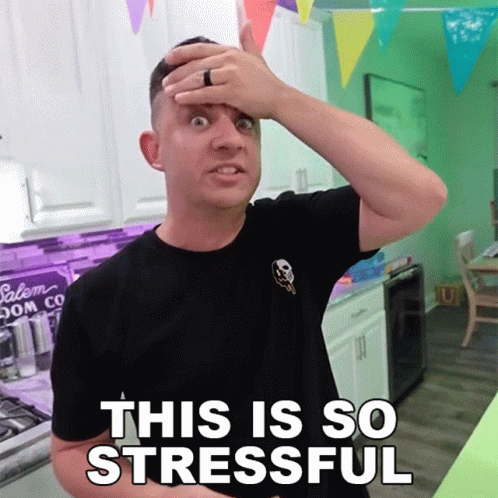 Black Shirt Man Hand on Forehead This Is So Stressful