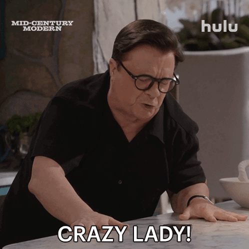 Black Shirt Man Says Crazy Lady Hulu Ad GIF