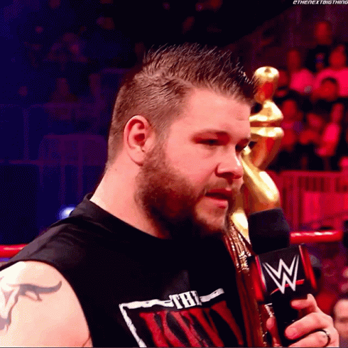 Black Shirt Man with The Next Thing and Microphone