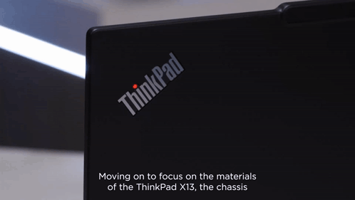 Black ThinkPad X13 Laptop With Text Moving On