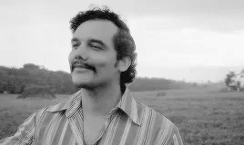 Black White Man With Mustache in Striped Shirt