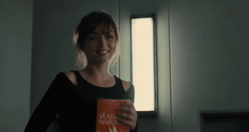 Blade Runner 2049 Joi Carrying A Book GIF