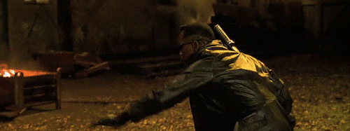 Blade Shoots Using His Gun GIF