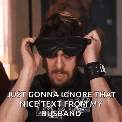 Blindfolded Man Ignoring Nice Text From Husband