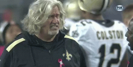 Blonde Bearded Man in Front of Colston Jersey Player