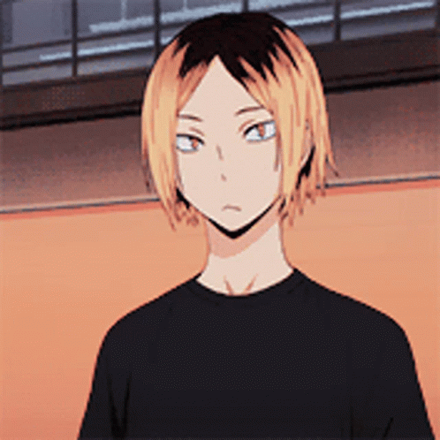 Blonde Boy Blue Eyes Black Shirt Looking at Camera