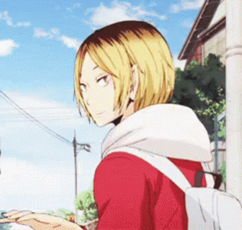 Blonde Boy in Red Shirt Walking with Backpack